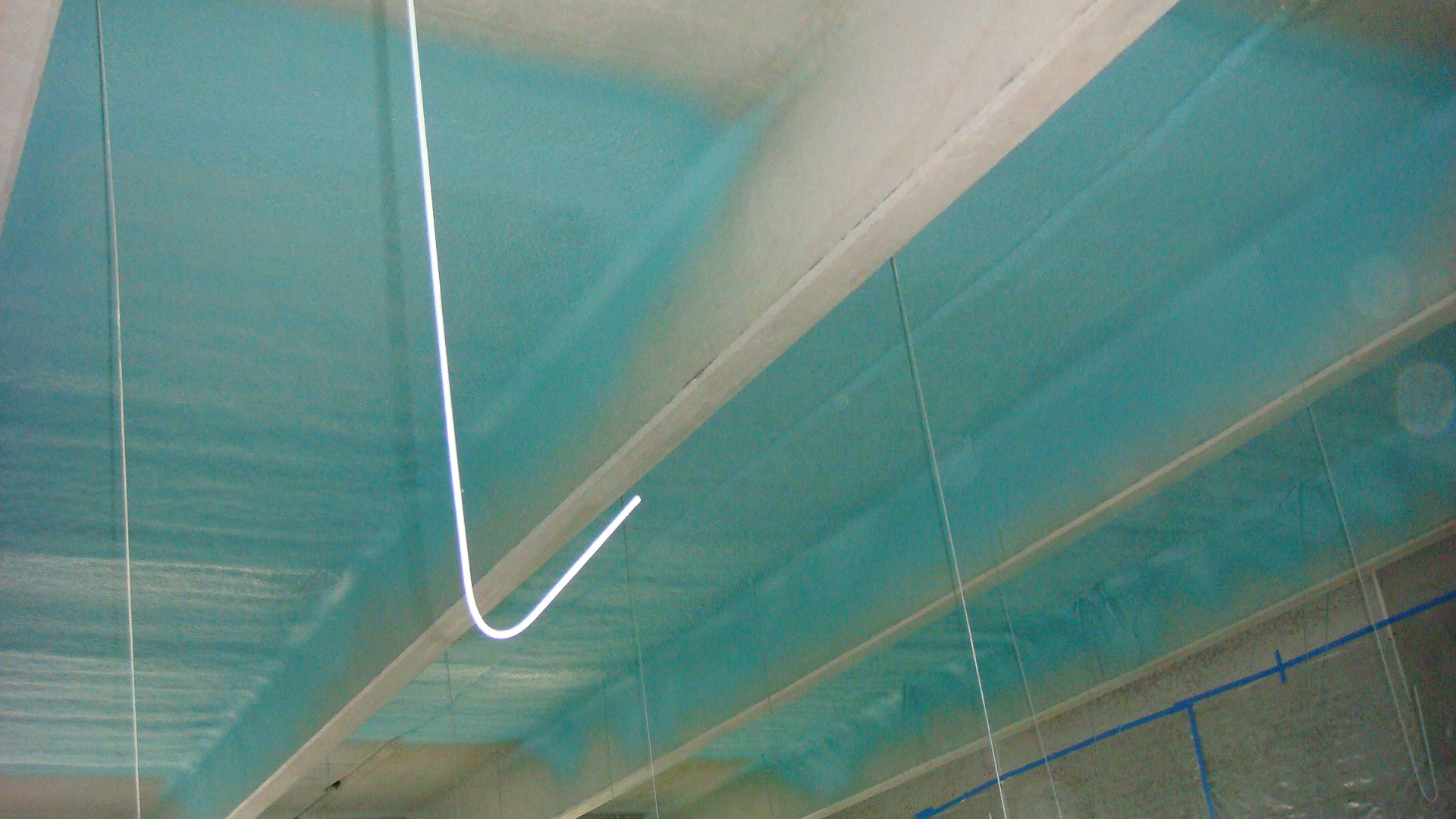 Structural steel coated with polyurea instead of a three-coat paint system